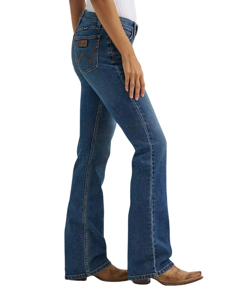 Side view of the women's retro mae marina jean featuring the boot cut leg with a 17.5" leg opening