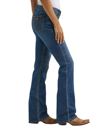 Side view of the women's retro mae marina jean featuring the boot cut leg with a 17.5" leg opening