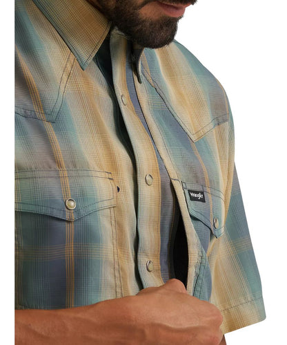 Close-up view of the napoleon chest pocket; the vertical zip pocket under the snap flap chest pocket