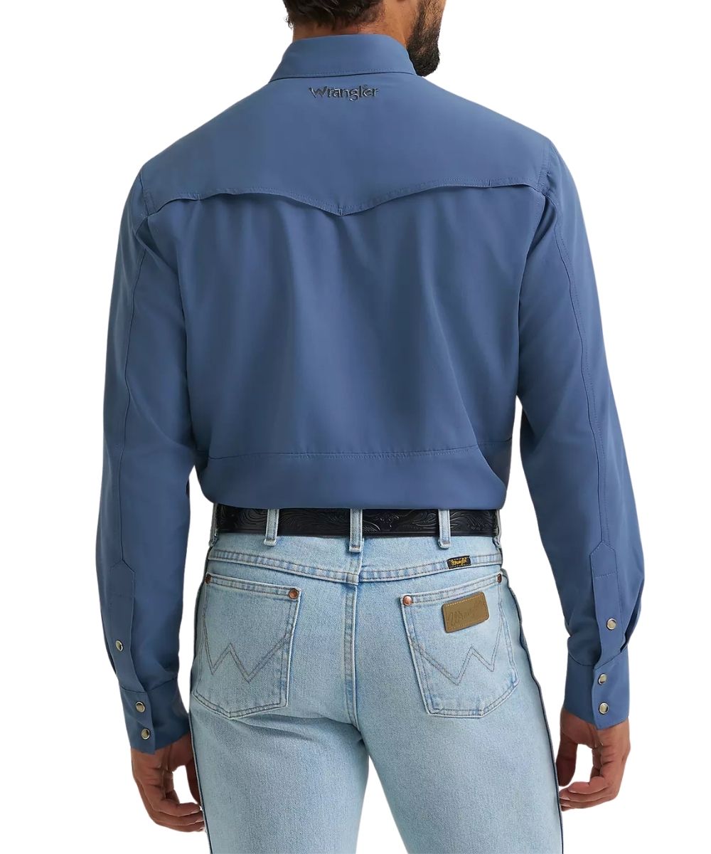 Back view of the men's long sleeve relaxed fit vintage indigo snap shirt featuring the vented back yoke with mesh lining