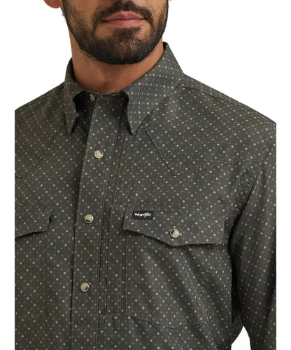 Close-up view of the men's dark green snap shirt featuring the deep depths lattice print