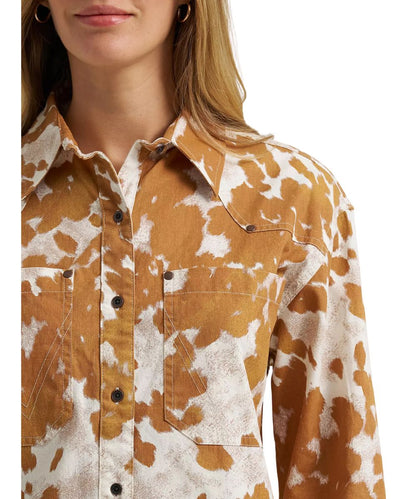 Close-up view of the oversized chest pockets, western yokes, and the copper rivet accents