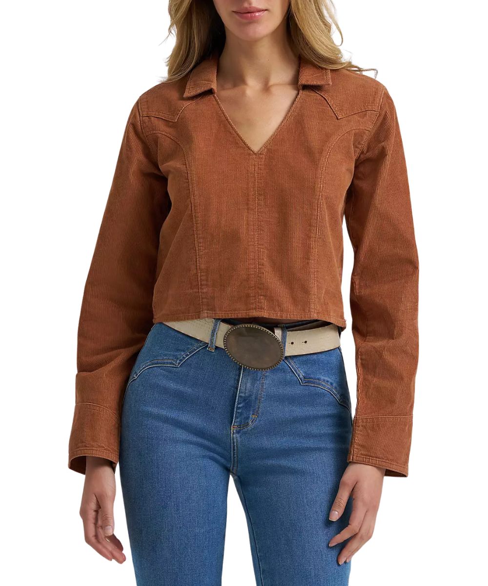 Front view of the women's Wrangler Prairie Popover Corduroy Shirt in brown featuring a collared neckline, v-neckline, and western yokes