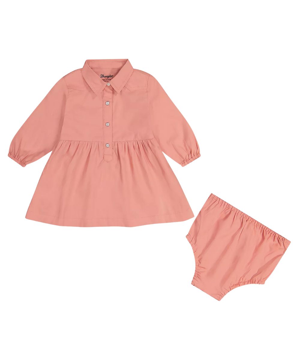 Flat view of the little girl's Wrangler Long Sleeve Western Snap Dress featuring the spread collar and gathered skirt with a matching diaper cover