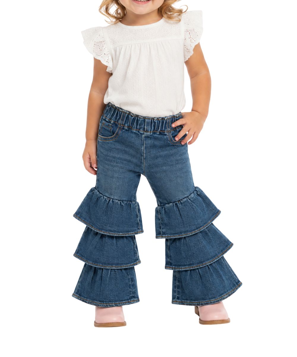 Model view of the little girls' Wrangler Tiered Flare Jean featuring the tiered ruffle leg in blue denim