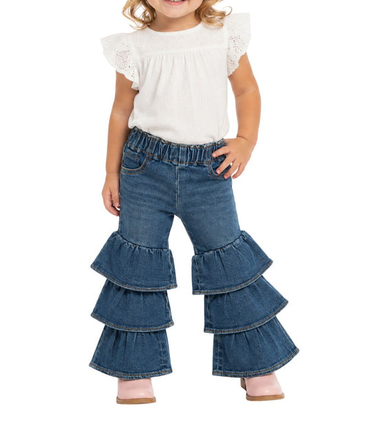 Model view of the little girls' Wrangler Tiered Flare Jean featuring the tiered ruffle leg in blue denim