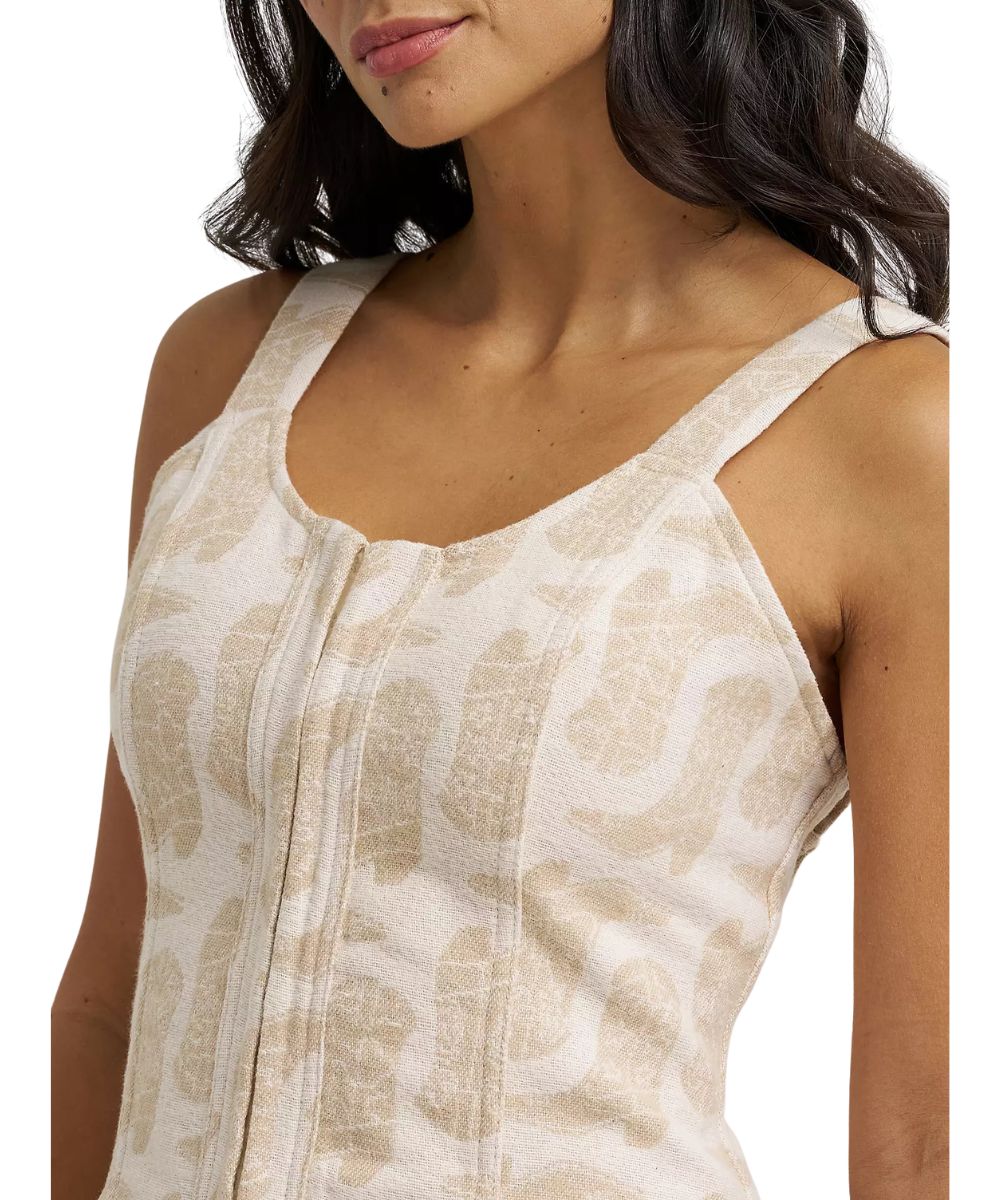 Close-up fabric view of the women's white corset tank top featuring the front hook-and-eye bar closure, round neckline, and a cropped length