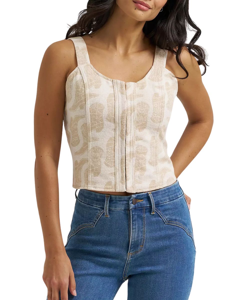 Front view of the women's Wrangler Jacquard Corset Tank Top in white featuring the beige cowgirl boot print