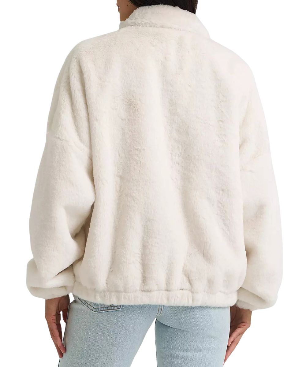 Back view of the women's white faux fur jacket featuring the relaxed fit, dropped shoulders, and elastic cuffs and hem