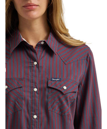 Close-up view of the striped print and snap flap chest pockets