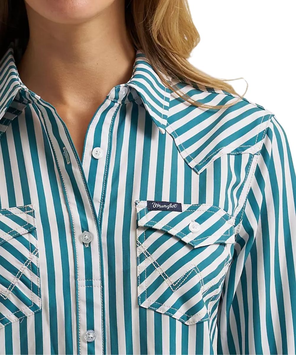 Close-up view of the faux button placket and single point button-through flap chest pockets