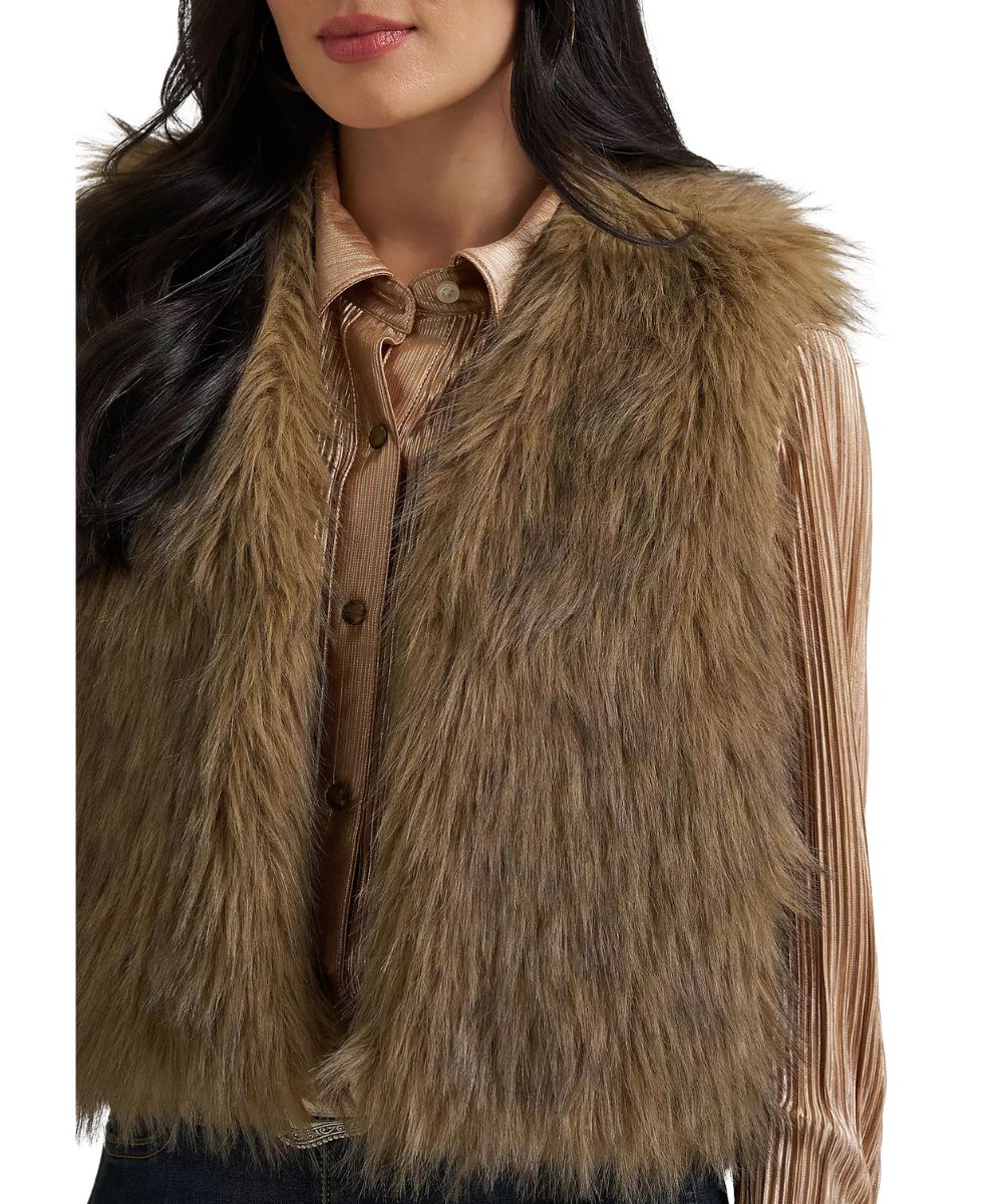 Close-up view of the brown faux fur vest