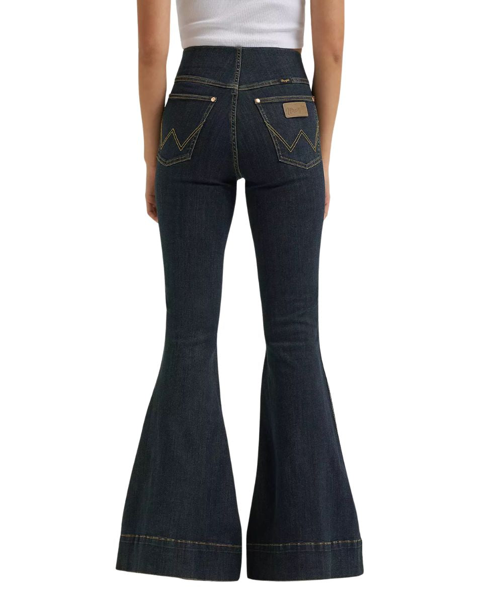 Back view of the women's sandrider pintuck bell bottom jean featuring the two back pockets with logo stitching and leather logo patch