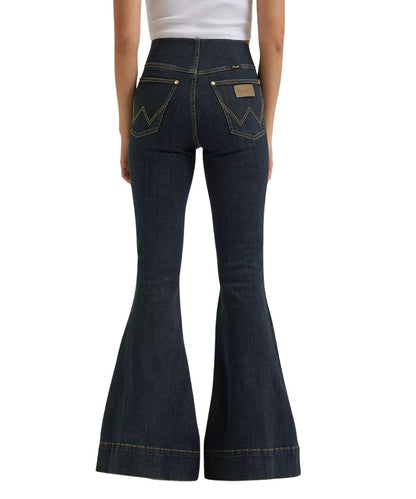Back view of the women's sandrider pintuck bell bottom jean featuring the two back pockets with logo stitching and leather logo patch