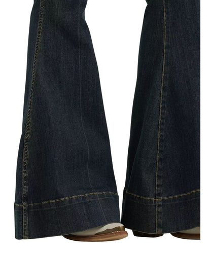 Close-up view of the trouser hem on the women's bell bottom jean featuring the 34" flared leg opening