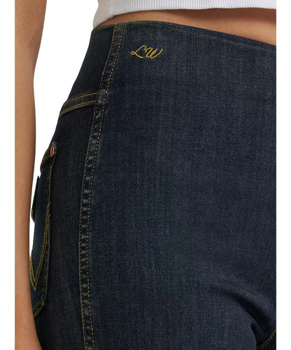 Close-up view of the elastic waistband, high rise, and Lainey Wilson's initial embroidery at the waistband