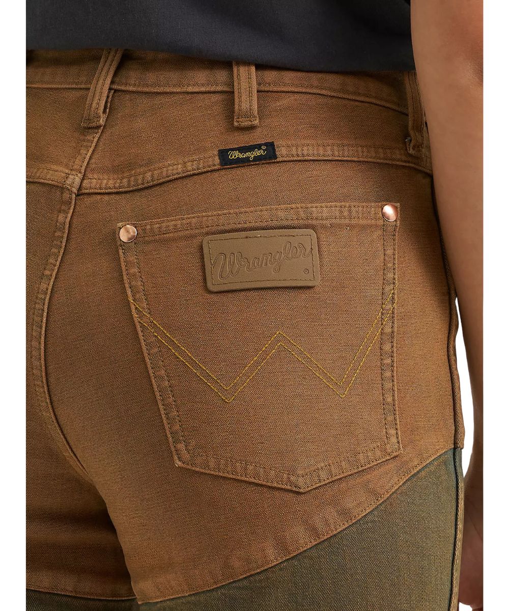 Close-up view of the logo stitched back pockets with leather logo patch