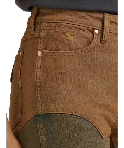 Close-up view of the front pockets featuring the slim fit, high rise, and Lainey Wilson's initials embroidered at the coin pocket