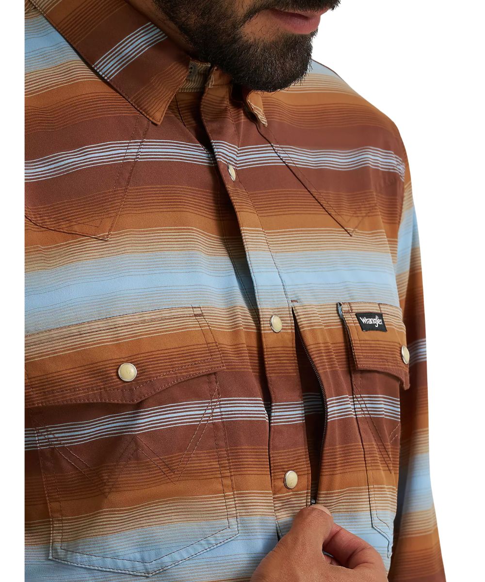 Close-up view of the invisible/hidden napoleon zippered pocket at the left chest pocket