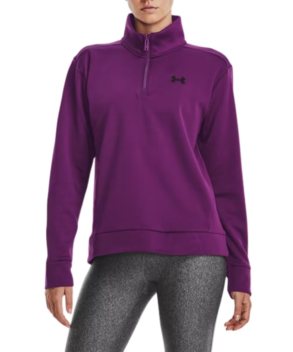 Front view of the women's purple Under Armour pullover featuring the long sleeves, mock collar, 1/4 zip closure, and the black logo at the left chest