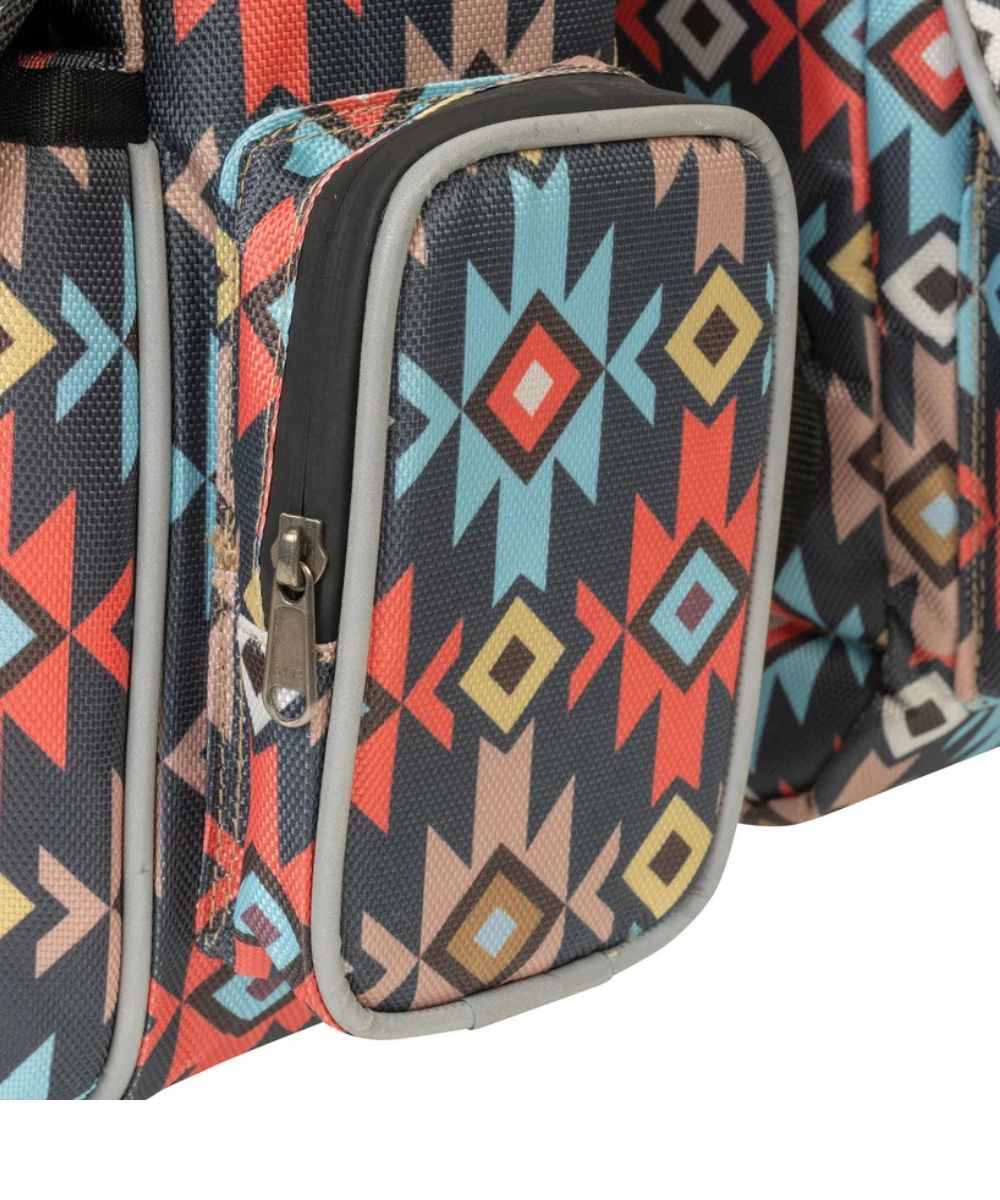 Close-up of a patterned zippered pouch on a matching bag, featuring a geometric Southwestern-style print in red, light blue, beige, and yellow on a dark background.