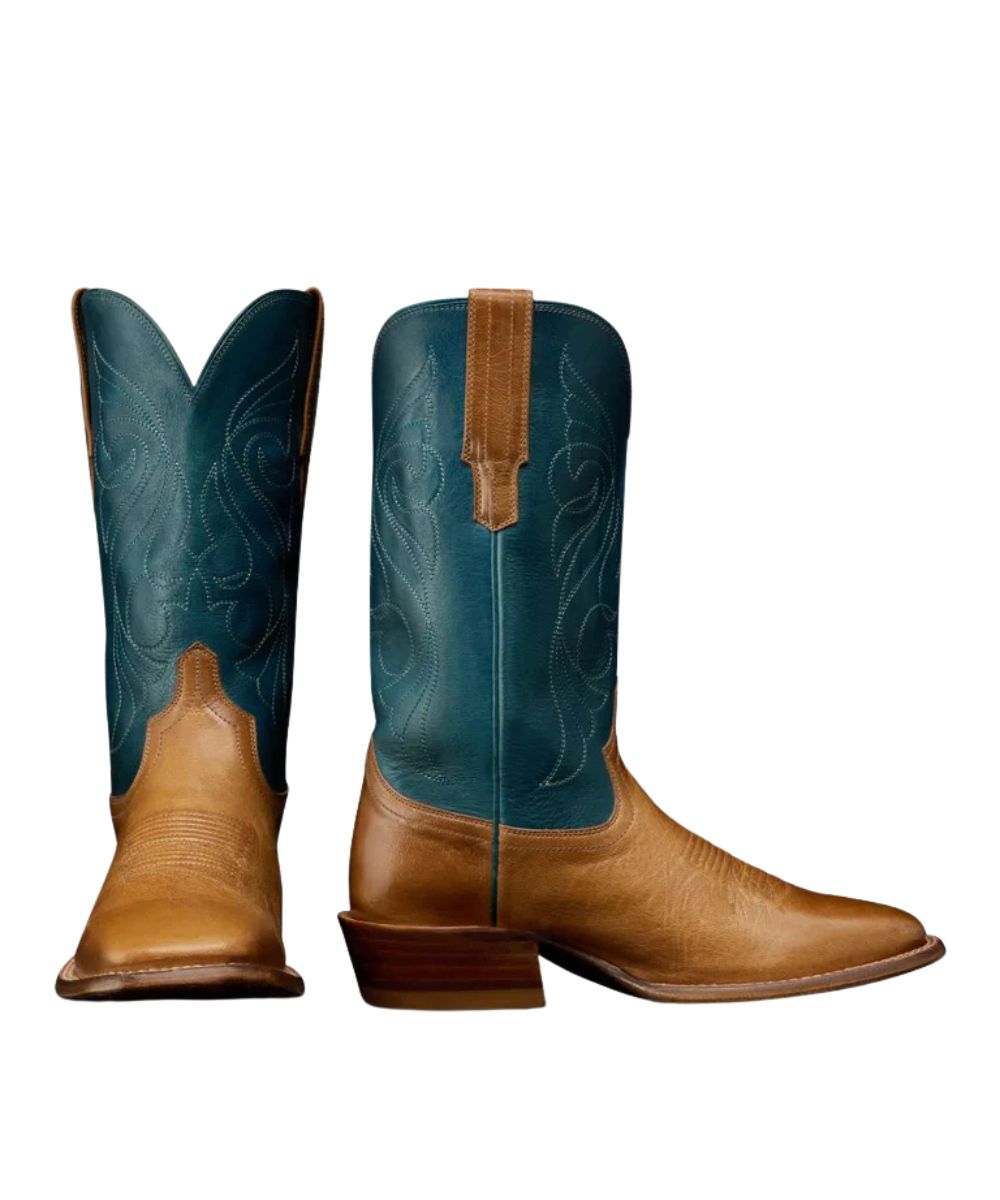 Pair view of the women's 11" goat leather boot featuring a signature toe bug on the tan vamp and contrast stitching on the teal shaft