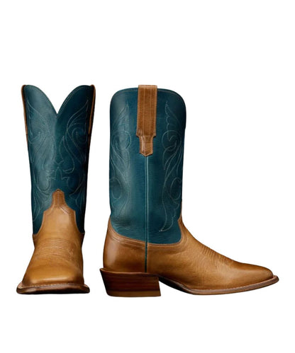 Pair view of the women's 11" goat leather boot featuring a signature toe bug on the tan vamp and contrast stitching on the teal shaft