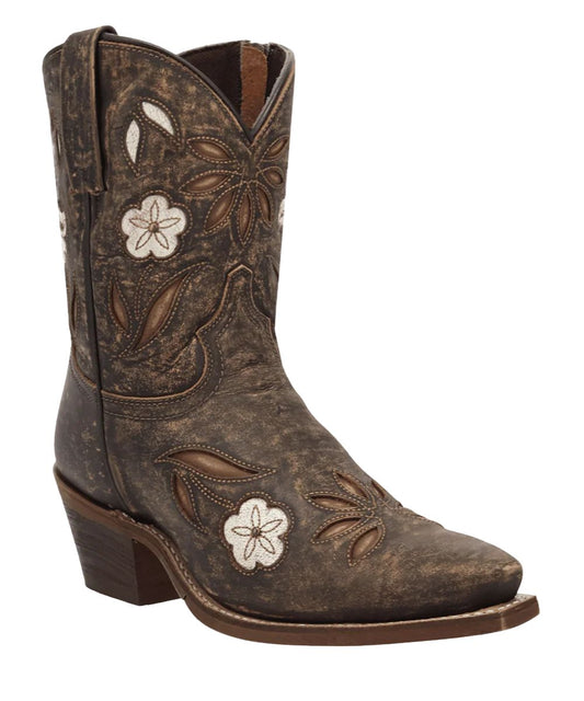 Angled side view of women's Wild Petal distressed black bootie featuring delicate detailed floral overlays and cutouts blending timeless western style with a feminine touch.