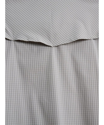 Close-Up View Of The Grey Check Plaid Print And Vented Yoke