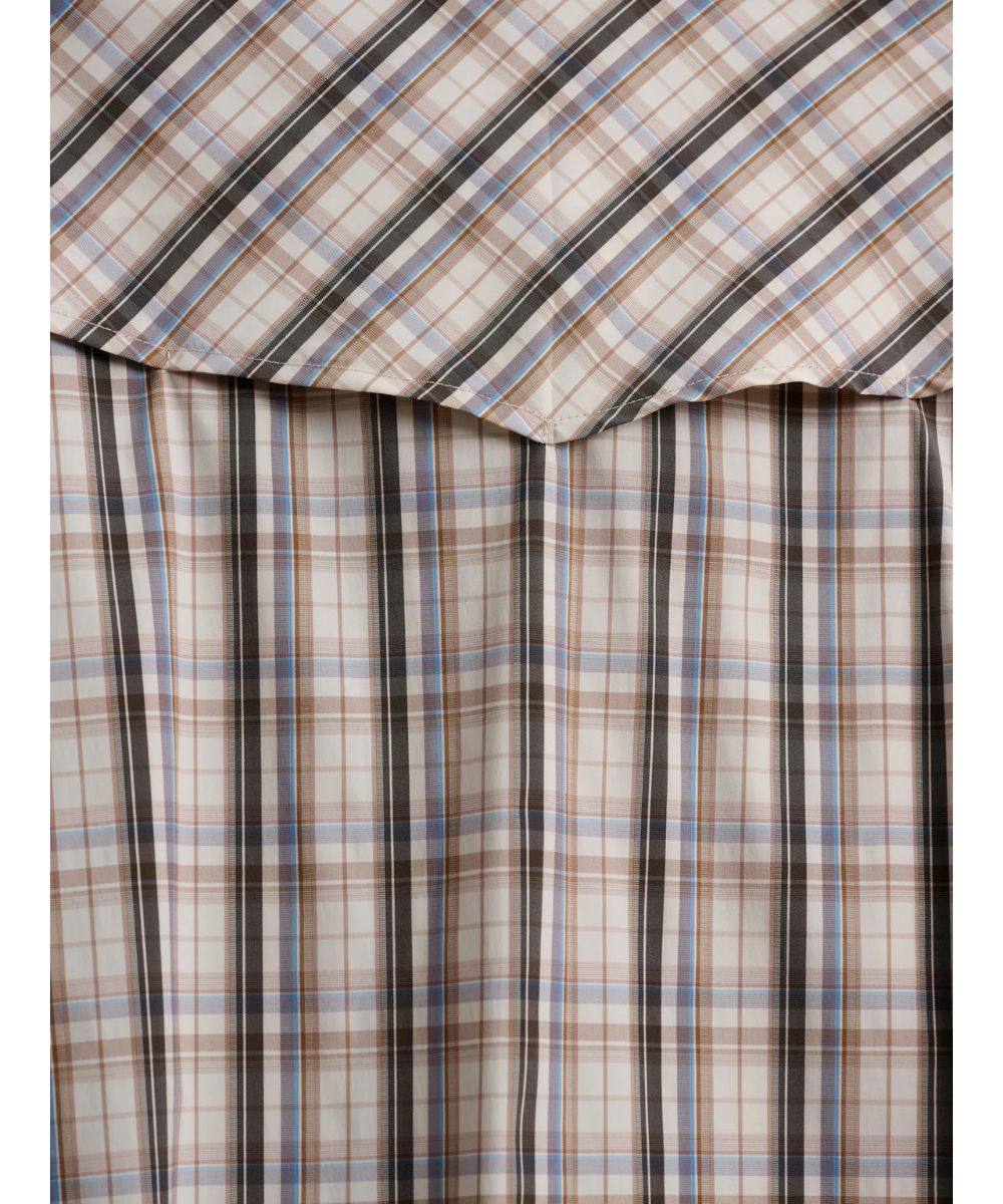 Close-Up View Of The Tan Plaid Print And Vented Yoke
