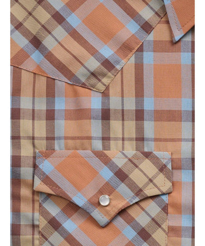 Close-up view of the brown and blue plaid print on the men's tan long sleeve pearl snap shirt