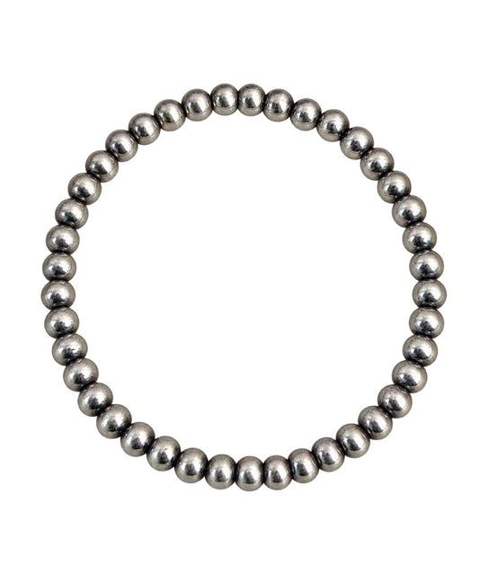 Flat view of the women's 4mm sterling pearl stretch bracelet by Z Bars Jewelry