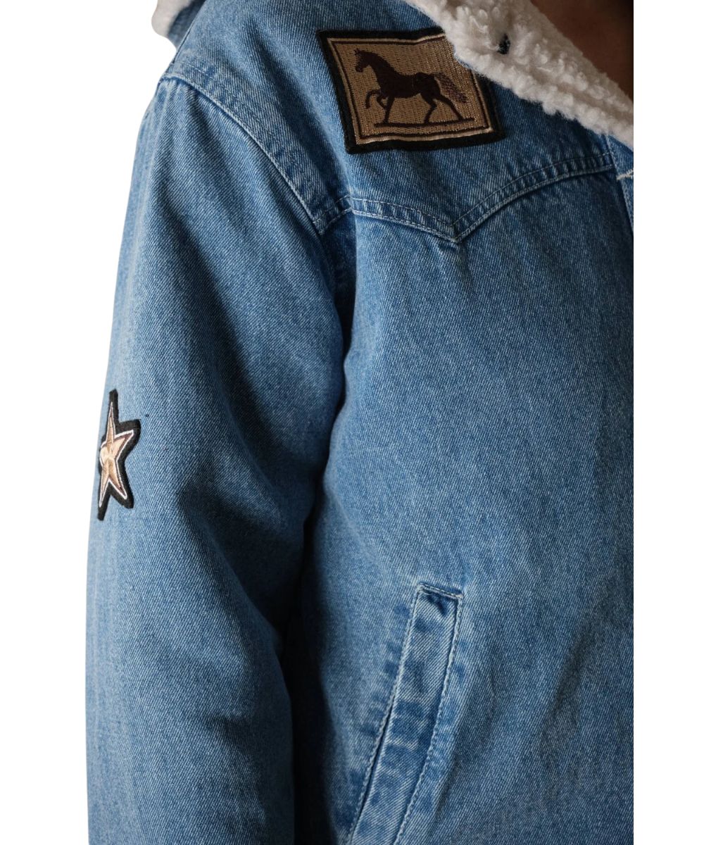 Close-up view of the side hand pockets, single point front yokes, and western-inspired patches