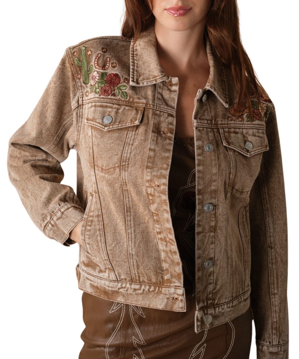 Front view of the women's mocha Blue B denim jacket featuring the relaxed fit, button closure, spread collar, button flap chest pockets, hand pockets, and western floral embroidery