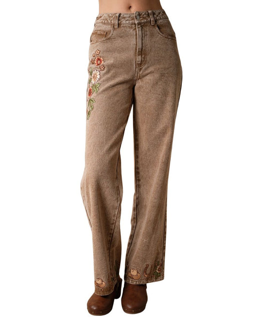 Front view of the women's mocha Blue B wide leg jean featuring the relaxed fit, high rise, zip fly with button closure, floral embroidery along the thigh, and western embroidery along the hems