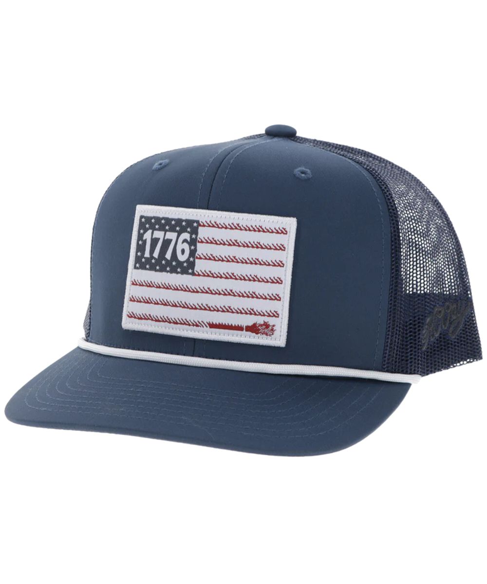 Left angled view of the youth navy blue cap featuring a 1776 flag patch