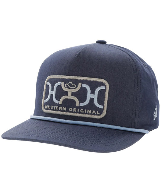 Hooey blue youth cap featuring a high-profile fit, hybrid bill, and a blue/grey logo embroidered on the front panel.