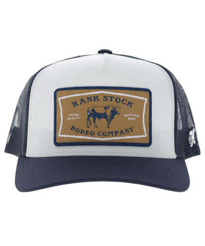 Front view of the white and navy Rank Stock ball cap featuring the high-profile fit, curved bill, and 5 panel construction