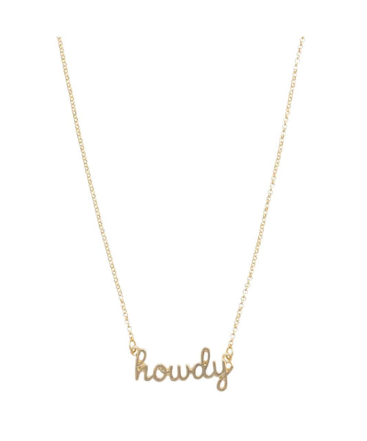 Flat view of the women's 16" adjustable shiny gold necklace with a cursive charm that reads: "Howdy" by Canvas Style