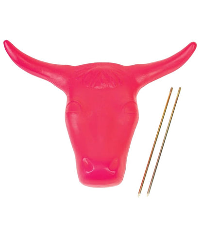 Pink plastic steer head roping dummy with spikes removed for easy travel