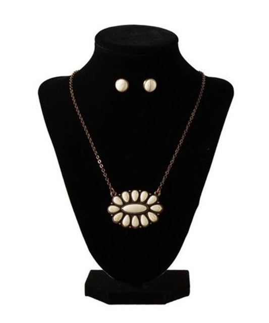 Front view of the women's Blazin Roxx Scalloped Oval Jewelry Set featuring the chain necklace with large pendant and white stone post earrings