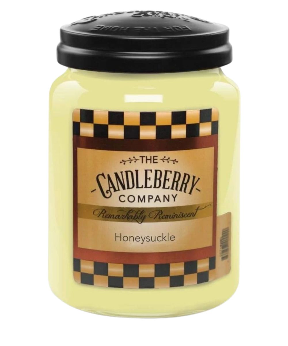 A jar candle from The Candleberry Company in the 'Honeysuckle' scent. The candle has pale yellow wax inside a clear glass jar, topped with a black metal lid, and features a rustic label with a checkered pattern.