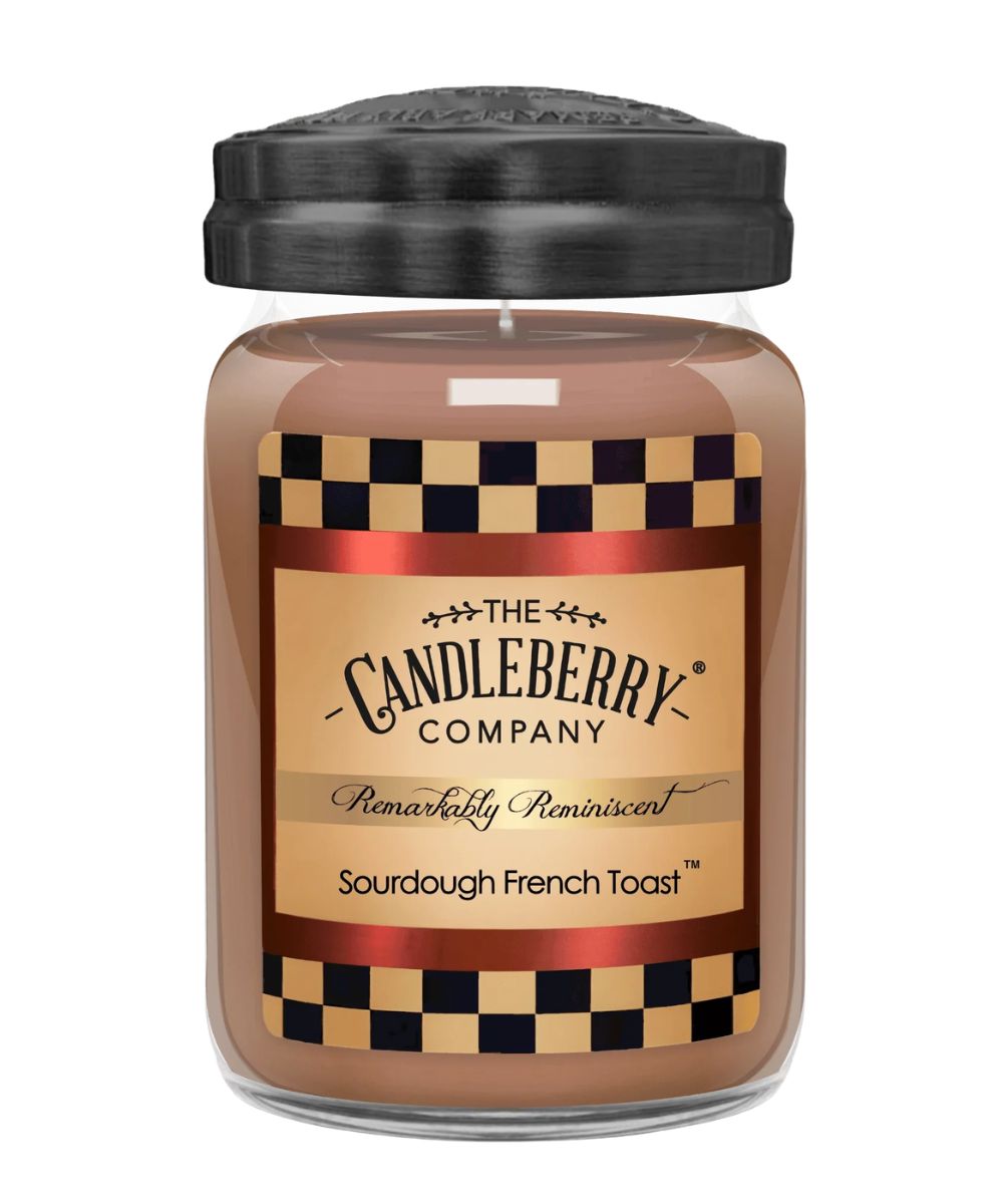 A jar candle from The Candleberry Company in the Sourdough French Toast scent, featuring a brown wax body, a black lid, and a tan label with a checkered pattern.