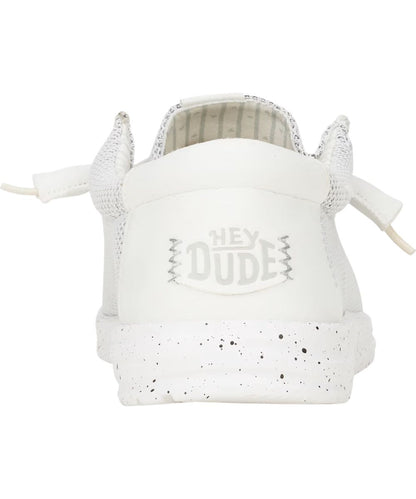 Heel view of the white contrast heel featuring the flat sole