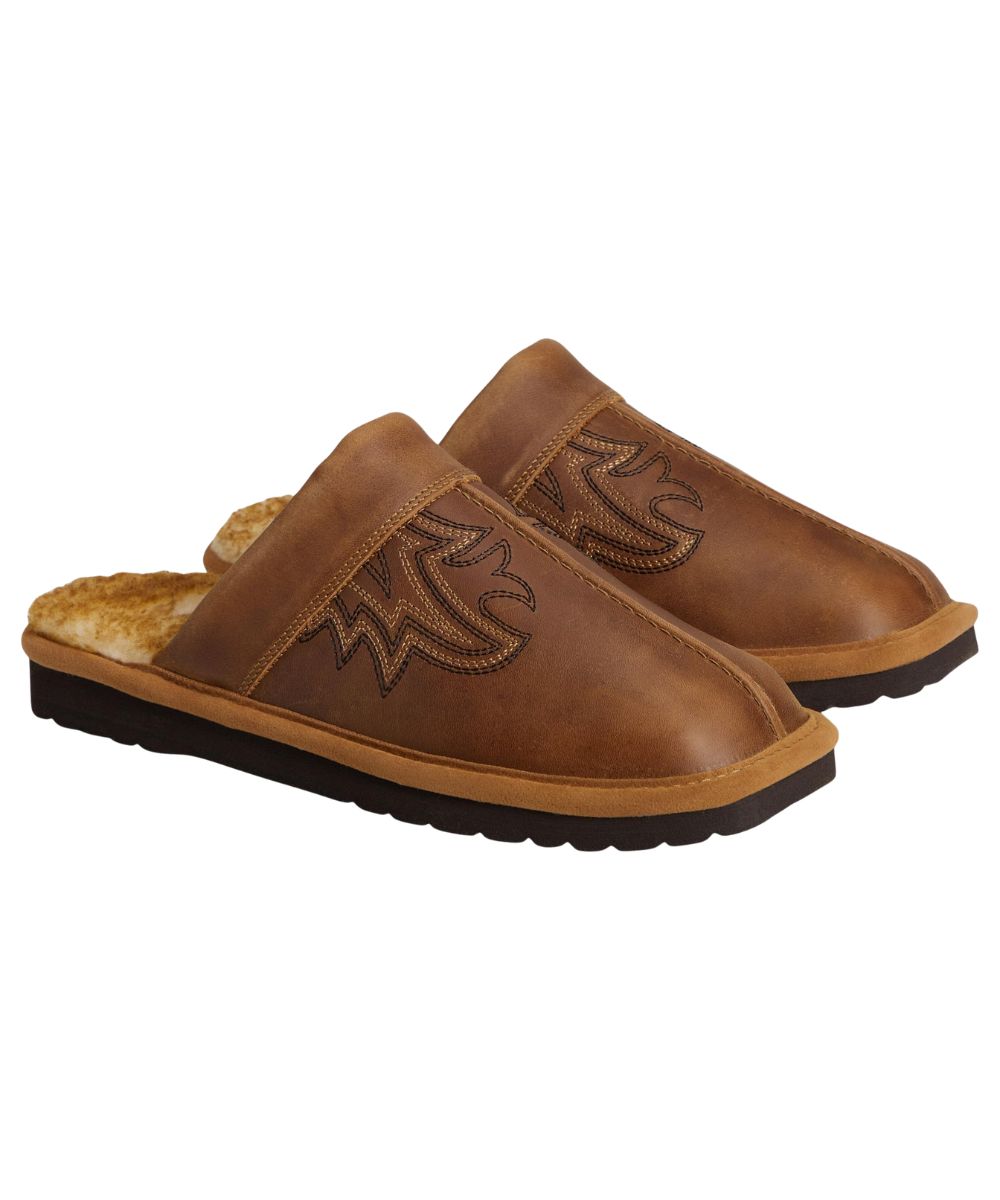 Men's distressed brown leather slippers with western stitch design, angled front view