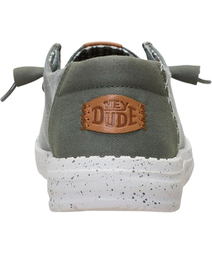 Heel view of the women's shoe featuring a contrast heel with logo label