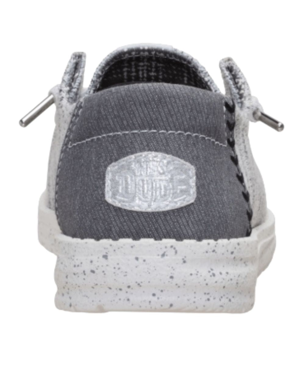 Heel view featuring the contrast heel with a shimmer logo label
