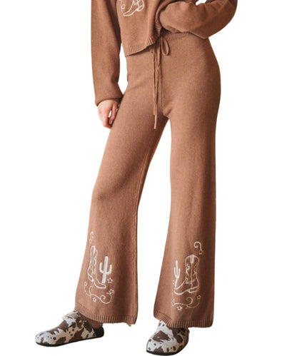 Front view of the women's mocha/brown Blue B cotton/wool wide leg sweatpants featuring the adjustable drawstring waist and western embroidered motifs at the hem