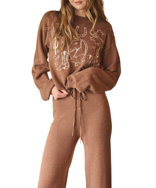 Front view of the women's mocha/brown Blue B cotton/wool relaxed long sleeve sweater featuring the western-inspired embroidery on the front