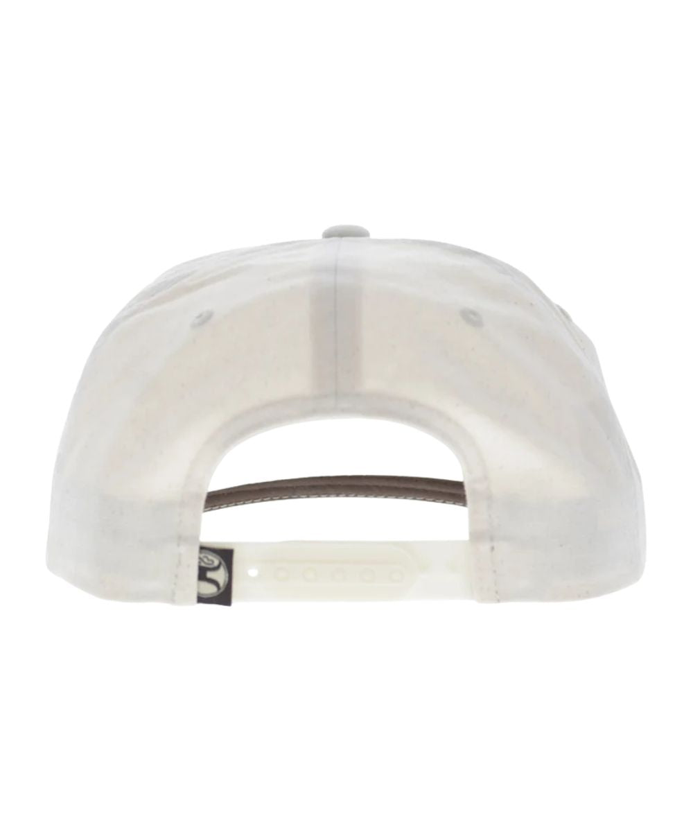 Back view of the cream cap featuring the adjustable snapback closure, one size fits most